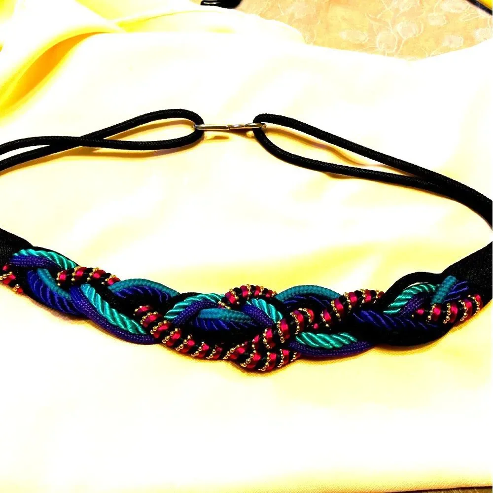Vintage 1980s vivid multicolor women’s braided belt. OS